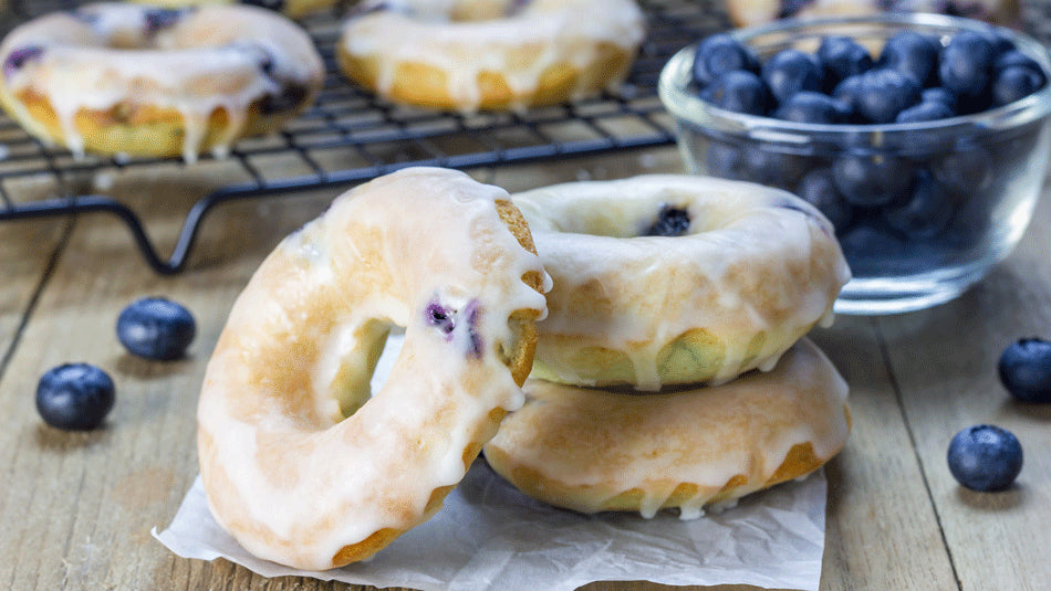 Want to make your weekend extra special without a lot of extra work and mess? These baked blueberry donuts with lemon glaze are the perfect treat, and they're so easy to make